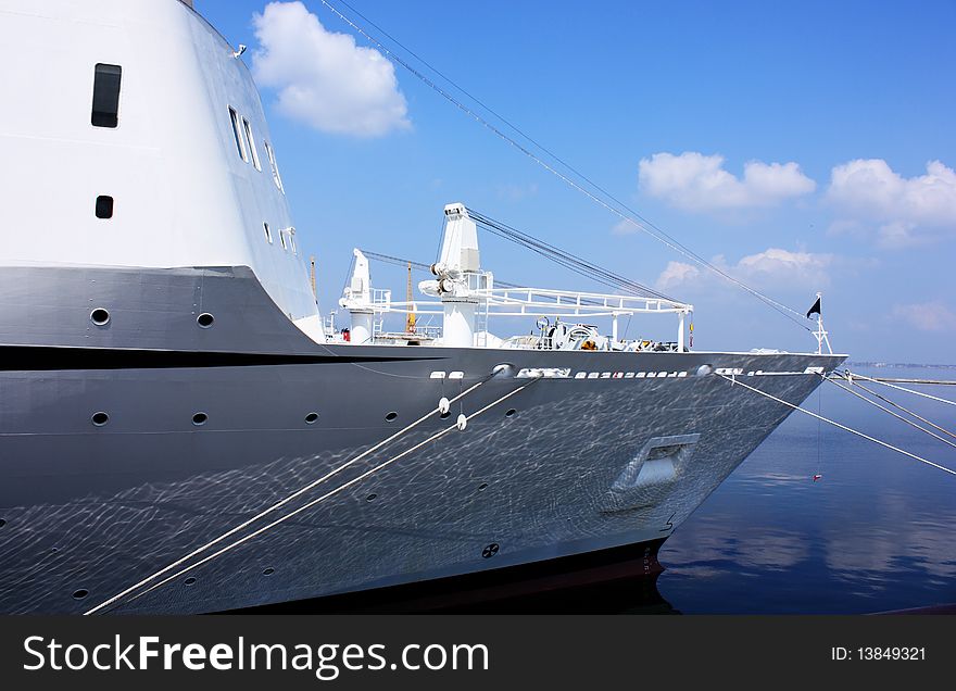 Big white vessel anchored in sea port. Big white vessel anchored in sea port