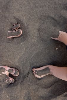 Feet In Sand Stock Images