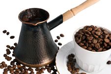 Pot Of Hot Black Coffee And Cup With Beans Stock Photography