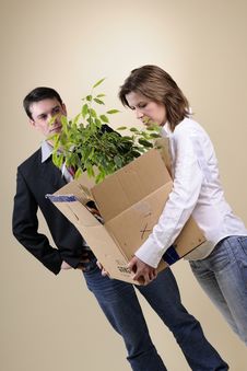 Upset Woman Leaving Office With Box Stock Photography Upset Woman Leaving Office With Box Stock Photography