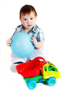 Boy With Baloon And Toy Truck Royalty Free Stock Photos