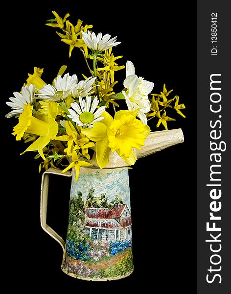 Spring bouquet in old oil can.