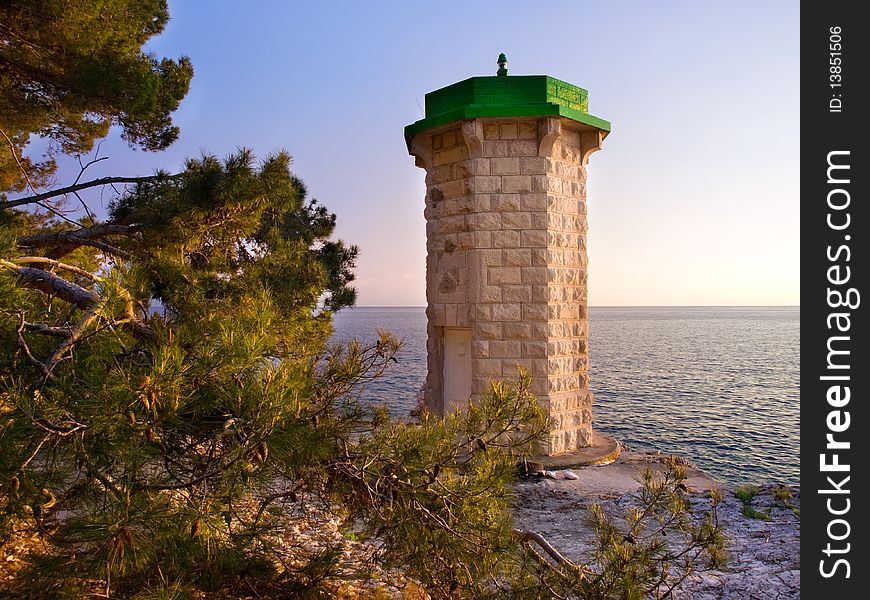 The old stone lighthouse, still in use somewhere on the Adriatic coast.