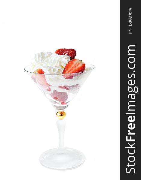 Fresh chopped strawberries with whipped cream in glasswares