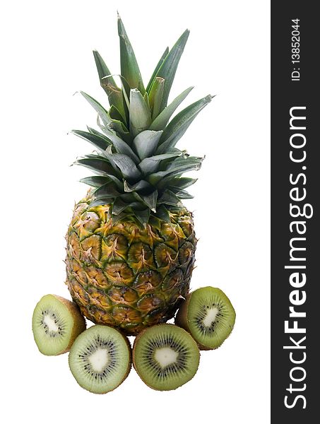 Pineapple with cut kiwi fruit isolated on white background. Pineapple with cut kiwi fruit isolated on white background