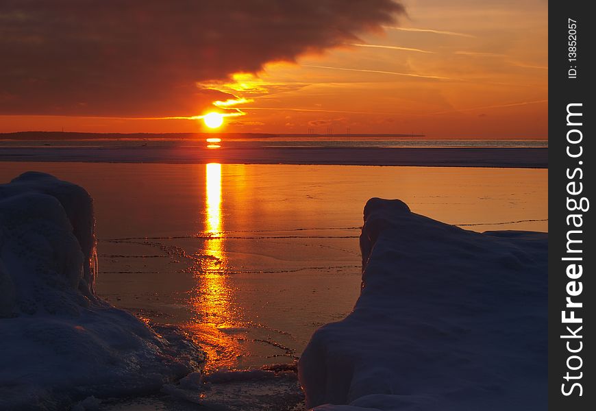 Freezing Sea Shore In The Romantic Evening Light