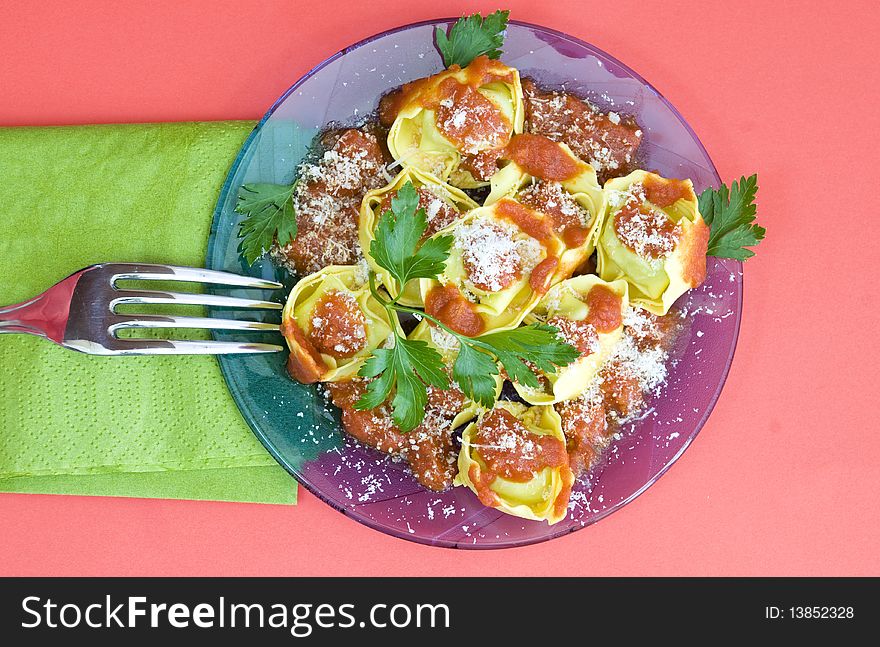 Italian fresh egg pasta lunch, with red sauce and parmesan. Italian fresh egg pasta lunch, with red sauce and parmesan