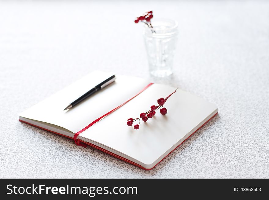 Romantic letter with pen and berries