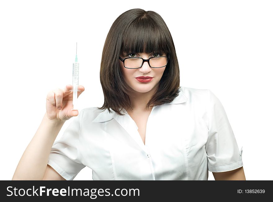 Beautiful young doctor with syringe in hand isolated on white background