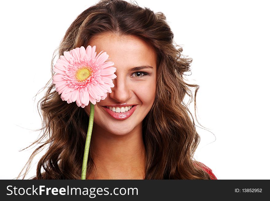 Young beautiful woman with pink fresh flower. Young beautiful woman with pink fresh flower