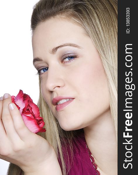 Woman in perfect skin face with rose in hand. Woman in perfect skin face with rose in hand