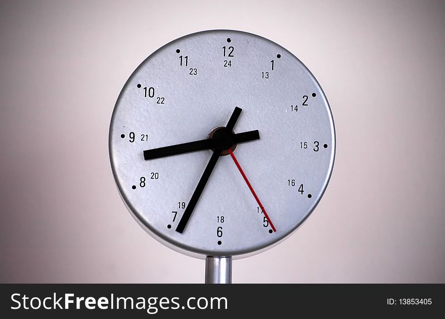 Silver Clock On Blured Background