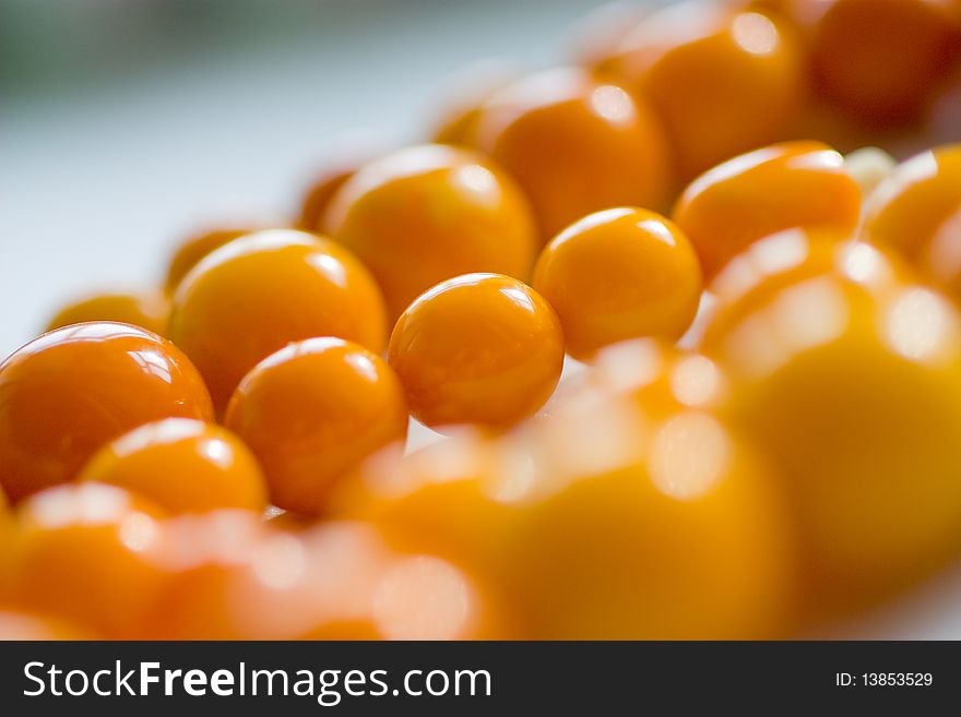 Amber Chaplet Macro With Sparkles Of Light On The