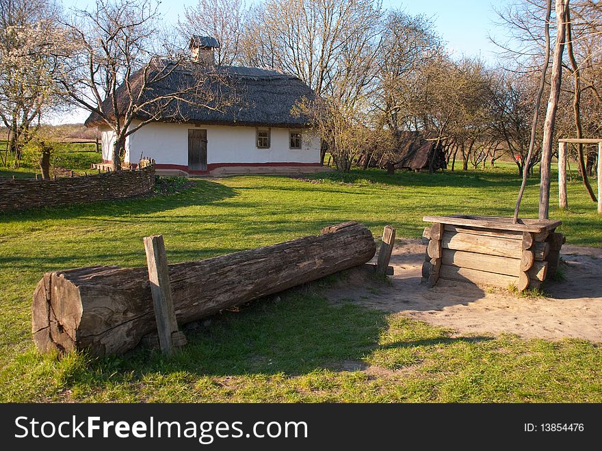 The old Ukrainian house with a well. The old Ukrainian house with a well