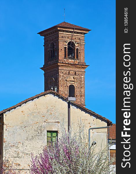 The church tower of the city of Carmagnola, Turin, Italy. The church tower of the city of Carmagnola, Turin, Italy