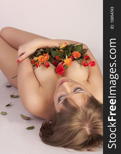 Sexual Girl With A Bouquet Of Roses