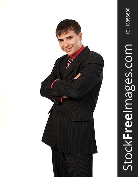 Portrait of successful businessman, smiling, white background.