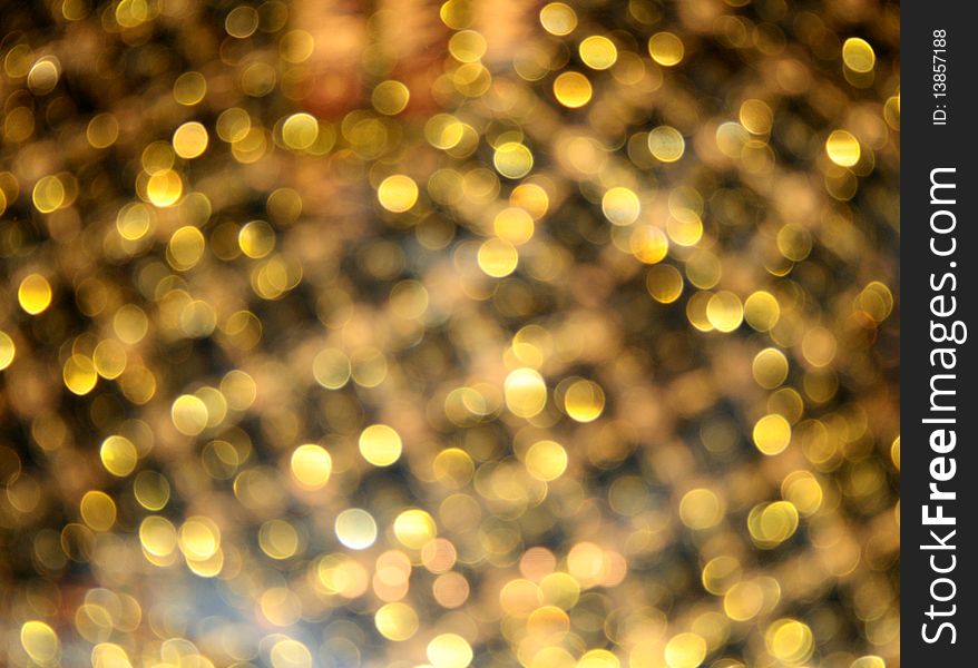 Abstract background consisting of many highlights golden