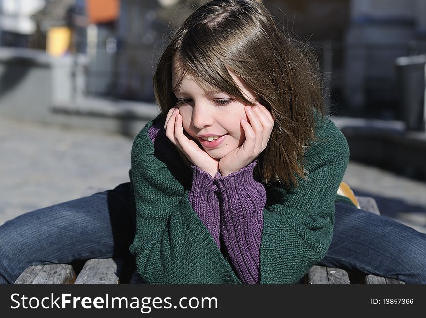 One happy child resting outside in spring season. One happy child resting outside in spring season