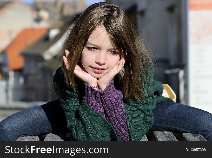 Beautiful happy child resting outside in spring season. Beautiful happy child resting outside in spring season