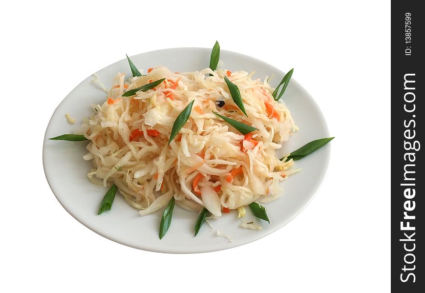 Salad with sauerkraut on a white dish