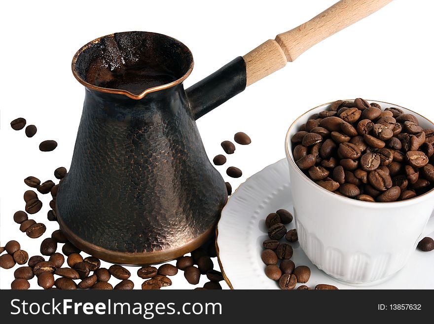 Pot of hot black coffee and cup  with beans  on white background. Pot of hot black coffee and cup  with beans  on white background