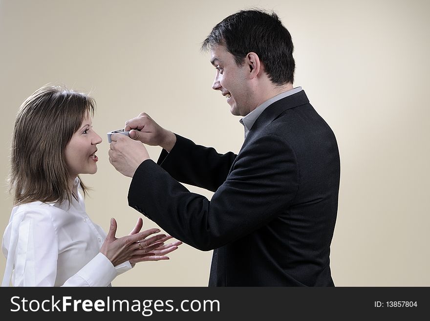 White man trying to close his wife mouth