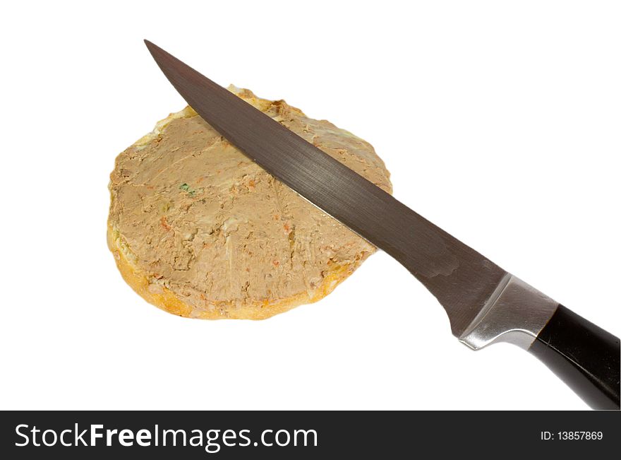 Whole wheat bread sandwich with liver pate and knife