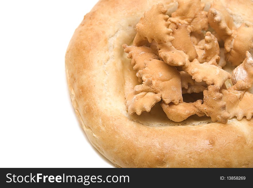 Part fresh bread from wheat and cookies close up. Part fresh bread from wheat and cookies close up