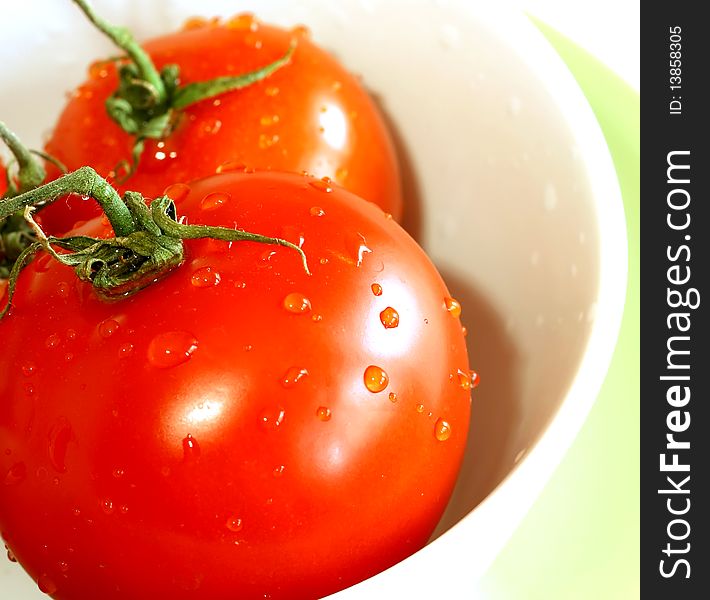 Ripe  tomatoes  in bowl with water drops. Ripe  tomatoes  in bowl with water drops