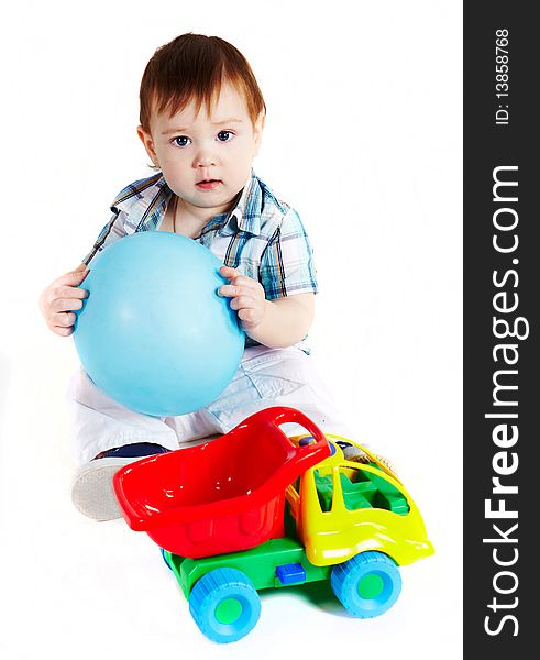 Boy With Baloon And Toy Truck