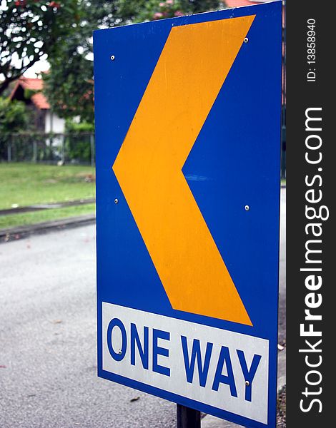 Sign board showing a one way sign.