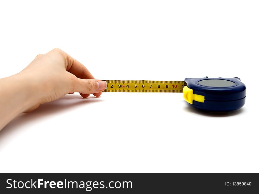 A tape measure with a hand holding it, isolated on white background. A tape measure with a hand holding it, isolated on white background