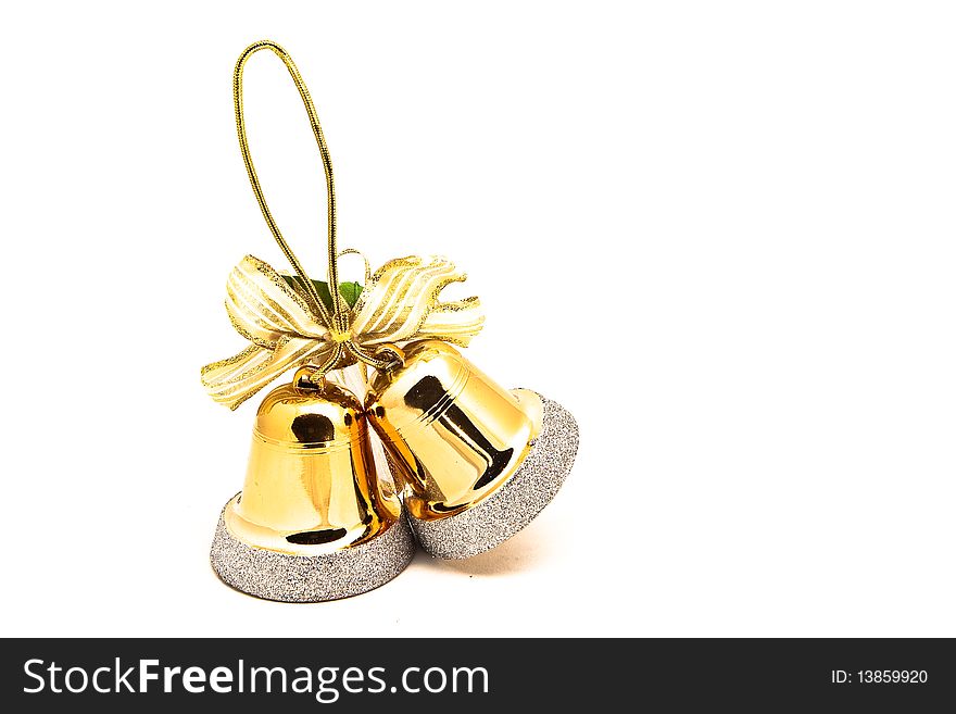 Fake brass gold colored bells Christmas decorations