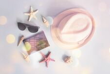 Free Summer Vacation Concept. Hat, Sunglasses, Passport, Starfishes And Seashells On Blue Background. Stock Photos - 138512563