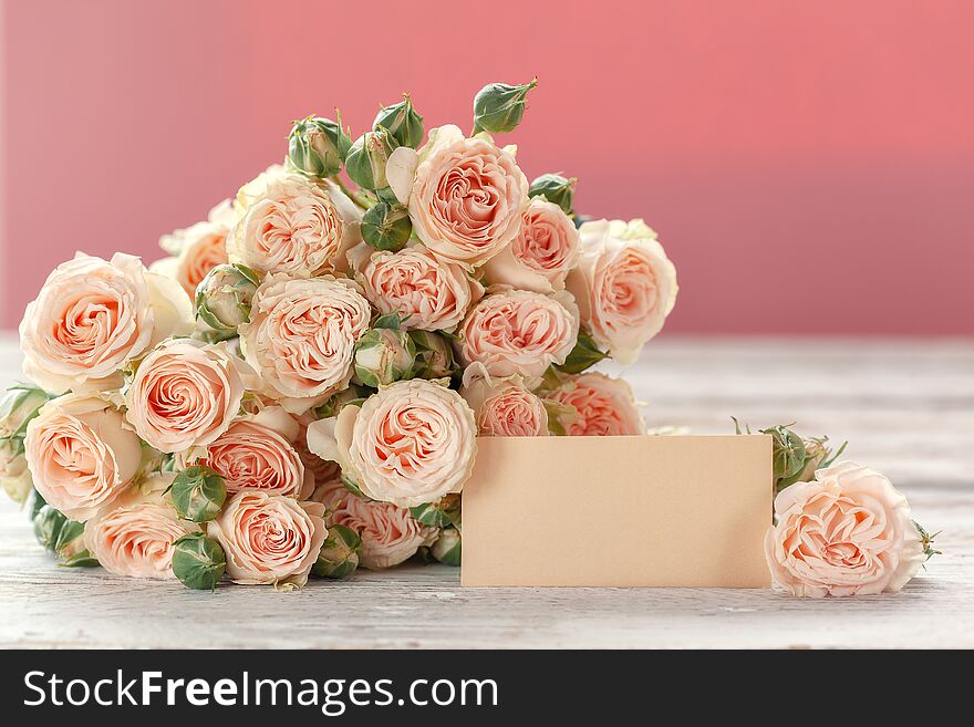 Pink roses flowers with ag for text on pink background. Mothers Day, Birthday, Valentines Day, Womens Day concept