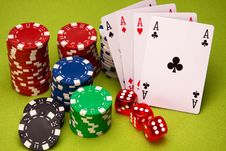 Casino Chips Closeup In Pointed Light Royalty Free Stock Photos