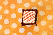 Petite Four On Polka Dot Background Stock Photos
