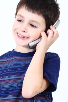 Smiling Small Boy Calling From Mobile Phone Royalty Free Stock Photography Smiling Small Boy Calling From Mobile Phone Royalty Free Stock Photography