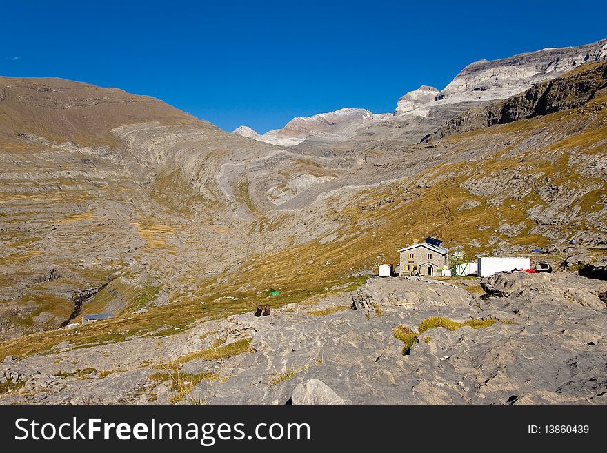 Refuge Goriz in background monte Perdido massif. Ordesa National Park - Spain. Refuge Goriz in background monte Perdido massif. Ordesa National Park - Spain.