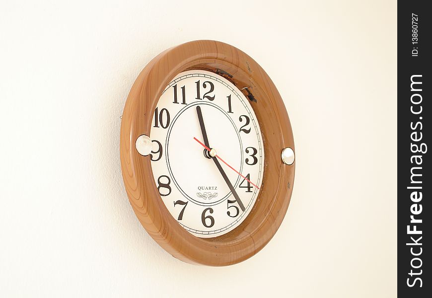 Wood clock on white background