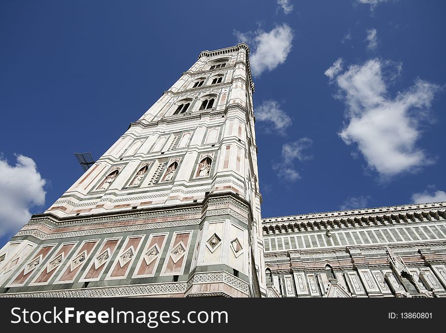 Giotto's Campanile - bell tower of famous Basilica di Santa Maria del Fiori, cathedral church of Florence in Italy