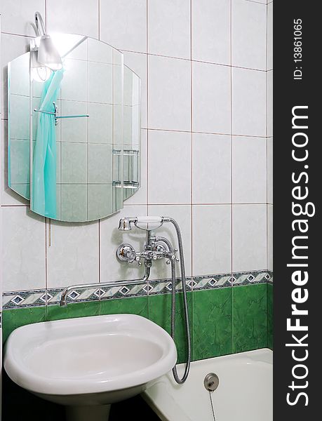 Modern bathroom of green colour