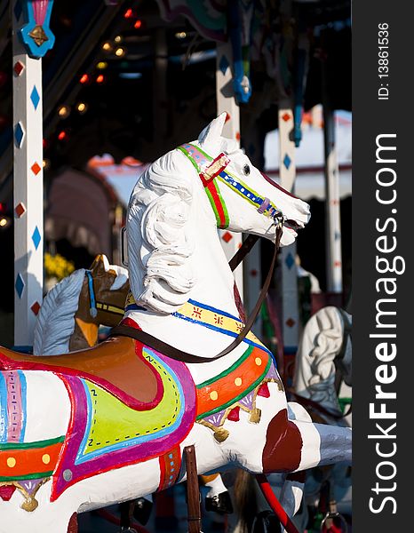 Old wood horse carousel on fun fair