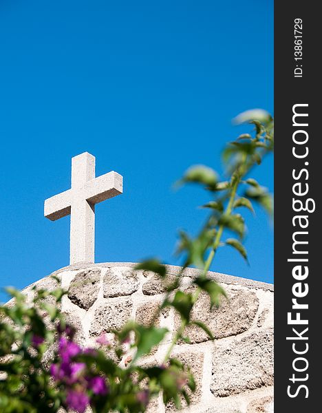 Greek church in santorini greece with a cross