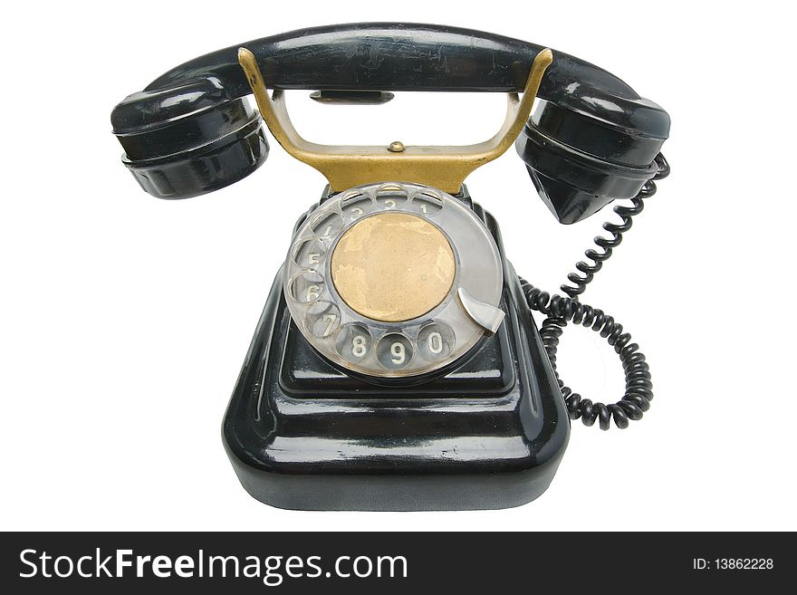 Old antique vintage traditional black phone with disc dials the 19th century isolated on white background . Russia. Old antique vintage traditional black phone with disc dials the 19th century isolated on white background . Russia.