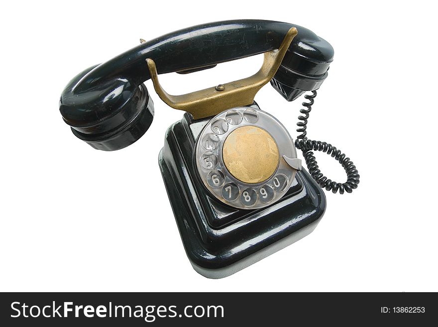 Old antique vintage traditional black phone with disc dials the 19th century isolated on white background . Russia. Old antique vintage traditional black phone with disc dials the 19th century isolated on white background . Russia.