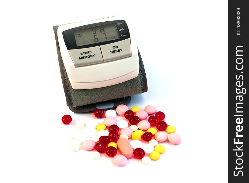 Tonometer, tablets on a white background