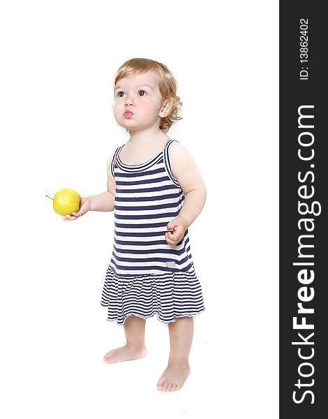 Cute toddler girl with green apple over white