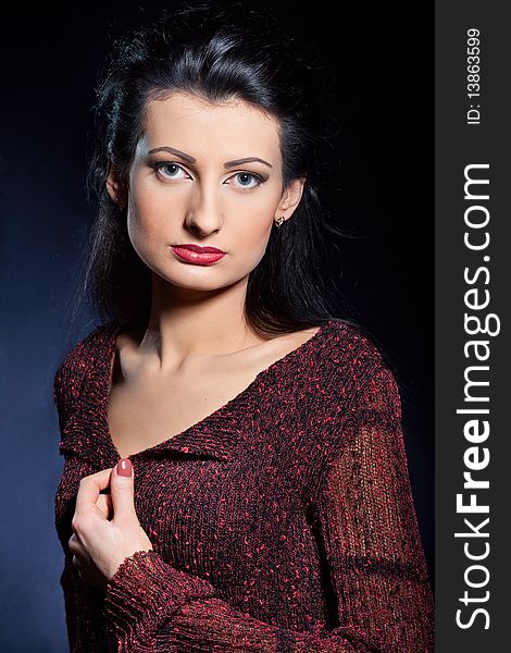 Studio portrait of attractive young woman